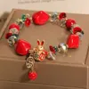 Röda nya pengar Endless Rabbit Armband är året för Dragon -förmögenheten med pärlkant för att skicka boudoir online rött