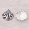 Breloques 10 X tibétain argent coquillage coquillage coque palourde pendentifs pour collier à faire soi-même fabrication de bijoux résultats accessoires 28x28mm