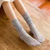 Femmes chaussettes femme mode printemps été Chic solide évider doux mignon dentelle mince décontracté moyen Tube Mujer classique Style européen