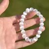 Bracciale in selenite in pietra naturale da 8 mm. Perle di energia per il potere curativo della pietra preziosa. Bracciale con perline rotonde in pietra elasticizzata elastica