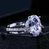 Кольца Huitan Овальное кольцо на палец с блестящим камнем CZ с четырьмя зубцами Классический подарок на годовщину свадьбы для жены, подруги 231024