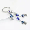 Chaveiros Azul Evil Eye Fátima Mão Chaveiro Liga Hamsa Palma Turca Sorte Proteger Charme Trinket Chaveiro Carro Chaveiro Amuleto Pingente