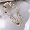 Avancerad koreansk stil liten doft Pärltröja kedja Långt mode Multi-Layered Camellia Pearl Necklace Women's Accessories Elegant