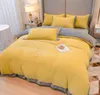黄色のレモンコーラルフリースの寝具4ピースベッドセットベジグナー寝具セット豪華なシェーカーフランネルベッドシーツお問い合わせロゴディンで写真を見る