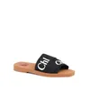 Pantoufle Sandale Casual Sliders Plat Luxe Designer Sandale Toile Woody Slide Femmes Mens Chaussure Blanc Noir Mules Imprimer Summer Beach Voyage Confort Piscine Mocassins Sabots