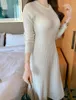 Casual Dresses South Korea Solid Color Slim-fit Temperament Base Skirt Set Head Round Neck Mid-length Long-sleeved Knitted Dress