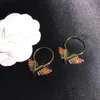 Boucles d'oreilles de créateur en cuivre et or 14 carats, boucles d'oreilles classiques en forme d'alphabet avec ailes en zircon colorées, article de mode indispensable pour les dames, Saint-Valentin, Noël, cadeaux de haute qualité