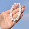 Bracciale in selenite in pietra naturale da 8 mm. Perle di energia per il potere curativo della pietra preziosa. Bracciale con perline rotonde in pietra elasticizzata elastica