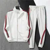 2024 Jesienna zima moda Red Green Stripes Męskie Tracksuit Luksusowy Muzyka Designer Windbreaker Oddychał White M-3xl