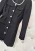 23デザイナー秋/冬のラインストーン大きな丸い首長袖ポケットデコレーションハイウエストスリムな黒いドレス