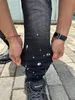 Projektant dla męskiej fioletowej marki dżinsy chude motocykl modne rozryte patchwork dziura przez cały rok szczupły nogawki