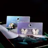 Smyckestativ 50st Fashion Laser Cardboard Paper Storage för tillbehörörhängen Kort Ear Studs Packing Hängen Hang Tag 231025