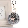 Keychains Lanyards Söt lilla ängelbil Keychain Fake Fur Key Chain Women Trinket Bag Ring Smycken Gift Fluff Keychains 231025
