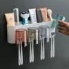 Portaspazzolino Portaspazzolino a parete Spremidentifricio automatico Dispenser per dentifricio Portaoggetti per tazze per spazzolini Accessori per il bagno 231025