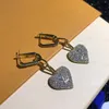 Orecchini firmati di moda, orecchini pendenti a forma di cuore con zirconi incorporati in rame dorato, orecchini con ciondolo a forma di cuore per donne, feste di matrimonio, regali di alta qualità