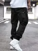 Мужские брюки-карго с боковым карманом и завязками на талии 231025