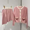 Contrast style miu single breasted knit cardigan long sleeved knit sweater jacket+pleated high waisted pleated skirt two-piece set for autumn