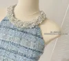 Kvinnors tvåbitar byxor High Street Girl Luxury Beading Liten doftande rutig Tweed Set Women Sexy Off Shoulder Crop Top Mini kjoldräkter