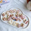 Accessori per capelli 20 pezzi/set simpatico cartone animato orso fascia ragazze copricapo in gomma elastica fiocco fiore ornamenti per bambini