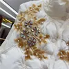 Coletes femininos trabalho pesado frisado diamante flores curto algodão colete imitação vison cashmere gola emenda sem mangas colete