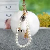 Keychains Fluffy 8cm Fur Pom Keychain Pearl Bow Crystal Llavero Pompon Keyring Ballet Love Key Chain Bag Charm Pendant Gift