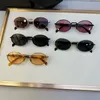 Ny modedesign Små ovala solglasögon 65Z Metal Frame Retro Form Enkel och populär stil mångsidig UV400 -skyddsglasögon