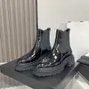 Marca de pele de carneiro tornozelo botas de moda dedo do pé redondo botas de couro de alta qualidade saltos baixos slip-on mulheres designer de luxo casual chelsea sapatos calçados de fábrica com caixa