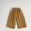 ズボンの子供のカジュアルパンツ2023冬の男の子と女の子韓国スタイルのソリッドカラー厚いコーデュロイキッズカシミアストレートレッグ