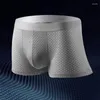 Sous-vêtements 5pcs / lot Sous-vêtements pour hommes Mesh respirant et confortable Muscle brillant Pure Soie de glace Antibactérien