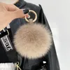 Keychains Lanyards Fluffy Real Fur Ball Poms KeyChain for Women Luxury Pompom Keyring Accessories Bag Decoration Emo Trinket Jewelry Gifts 231025