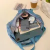 Сумки на плечо Сумки Женская однотонная сумка для души вместительная винтажная сумка-мессенджер регулируемый ремень на плечо Джинсовая сумка Star для работы Travelqwertyui45
