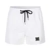 Stone Brand Island Giacca da donna 23ss Costumi da bagno da uomo Il distintivo ricamato del designer è terra Pantaloncini Pantaloni Summer Fashion Streetwear Pantaloncini da spiaggia per costumi da bagno ad asciugatura rapida