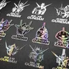 Adesivi giocattolo per bambini adesivi murali decorativi anime Gundam adesivi laser bidimensionali adesivi per auto creativi impermeabili adesivi per telaio rimovibili 231025