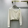 女性のセーター2023ファッション秋のワンショルダーチェーン編みハイエンドセーターSMLを販売