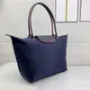 2024 Designer Tote Bag Borsa classica in nylon Borsa da donna di grande capacità Borsone da fine settimana Bagaglio a tracolla con tracolla Borsa da uomo Hobo Clutch Shopper Borse da viaggio