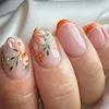 Faux ongles français manucure automne fleurs ongles conseils détachables longs ovales presse sur les femmes