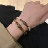 Strand Prachtige handgemaakte armband in Tibetaanse stijl met vintage etnische bedels