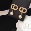 Orecchini placcati oro 18 carati Designer per donne C Lettere geometriche Famoso cristallo strass Orecchino di perla Festa di nozze DesignerJewerlry