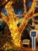 クリスマスデコレーションソーラーパワーガーランドフェアリーストリングライト100200 LED 8モード屋外ガーデンランプウェディングパーティーフェストゥーン装飾231026