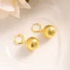 Boucles d'oreilles pendantes de sphère de cercle de perles