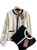 女性カーディガンスプリングロロピアノカシミア長袖黒と白のセーター