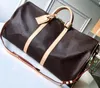 5A أكياس Duffle M41416 50cm Keepall Bandouliere 50 Momogran Eclipse Travel Counter Handbags Pustis For Women with Dust Bag Fendave