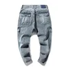 Pantalones vaqueros para hombre Hip Hop Hombres Pantalones Harem Azul claro Estiramiento suelto Ajuste primavera y verano Bolsillos múltiples Diseñador Pantalones de hombre de gran tamaño 231025