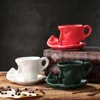 マグカップティーヘッドのデザートコーヒーマグヨーロッパの装飾抽象スプーフィング絶妙なカップルカップソーサーセラミックオフィスホームフェイス231026
