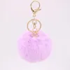 Nyckelringar Kvinnor Päls Key Chain Car Keychain Pom Pompom Färger med Hexagonal Bag Charm Söta ringsmycken