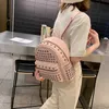 INS Super Hot Rivet Small Backpack Female 2024 새로운 디자이너 학생 미니 학교 주머니 PU 가죽 레저 지갑 아울렛