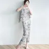 Kvinnors tvåbitar byxor Miyake veckad kostym för kvinnor 2023 Summer Fashion Graffiti Tryck lös och oregelbunden topp casual tvådel
