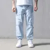 Pantaloni da uomo con tasca regolabile, pantaloni jogger solidi casual, orli con coulisse