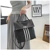 wholesale shoulder bag simple and versatile waterproof Oxford casual backpack flip lightweight leather student backpack this year's popular striped handbag 669#