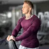T-shirt da uomo skinny a maniche lunghe Palestra Fitness Bodybuilding Elasticità Compressione Camicie ad asciugatura rapida T-shirt da allenamento maschile Top Abbigliamento H218s